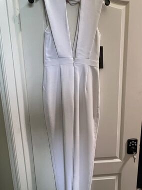 bebe White Skinny Jumpsuit with Deep V-Neck